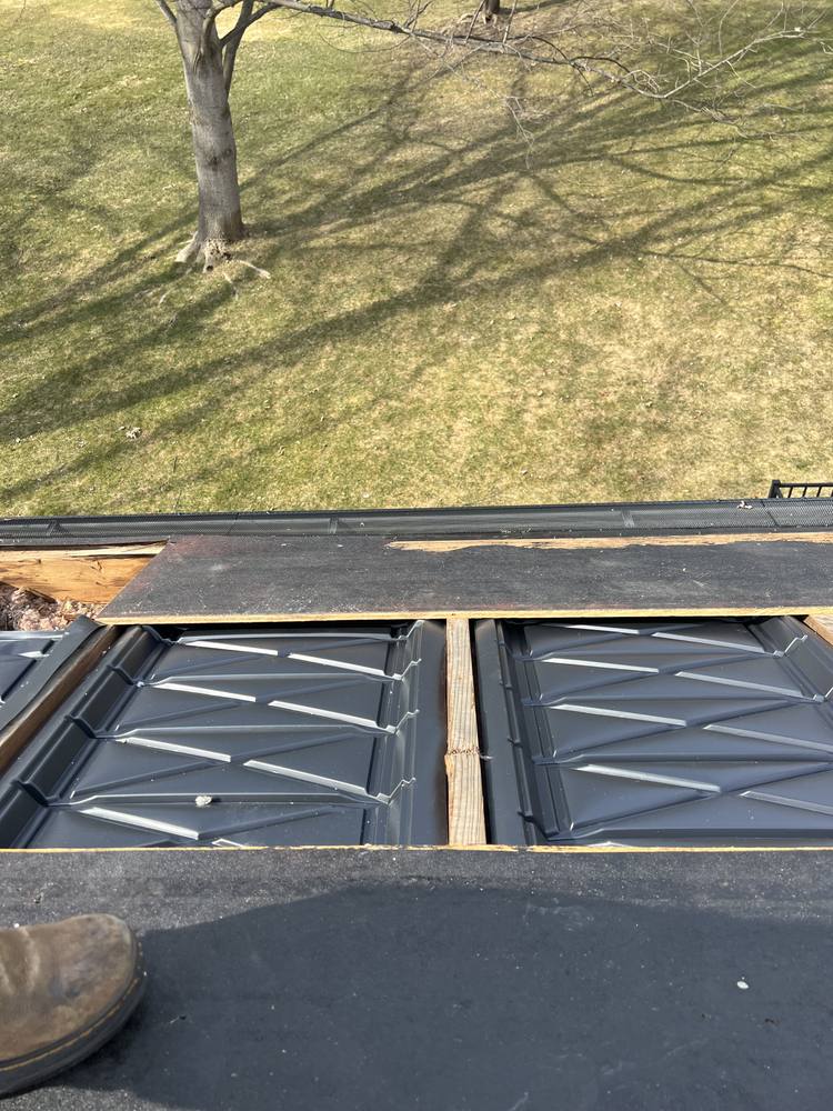 Eave Edge Leak Repair and Intake Vent Upgrade in West Michigan — photo 12 of 16