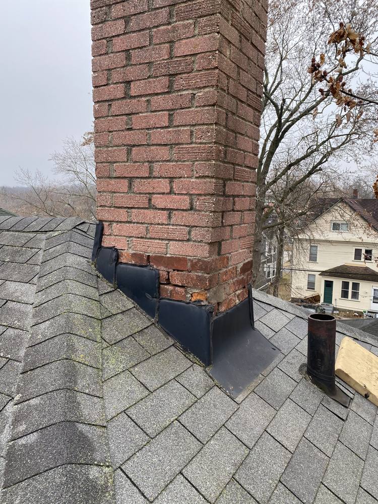 Chimney and Flue Pipe Re-Flash in West Michigan — photo 1 of 15