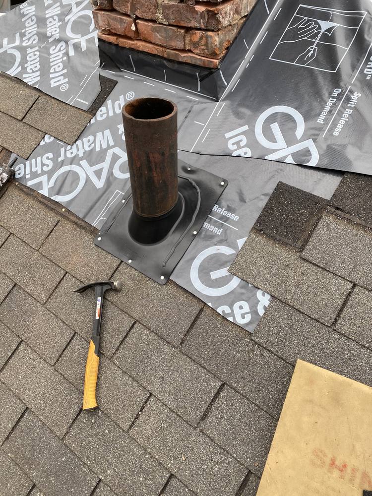 Chimney and Flue Pipe Re-Flash in West Michigan — photo 7 of 15