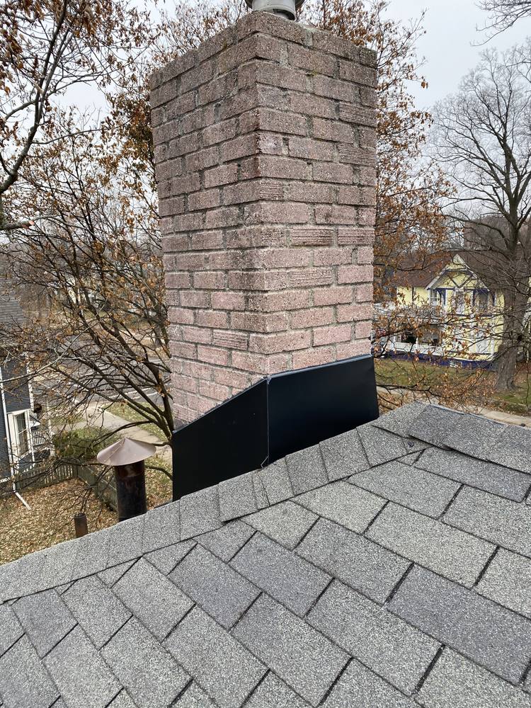 Chimney and Flue Pipe Re-Flash in West Michigan — photo 14 of 15