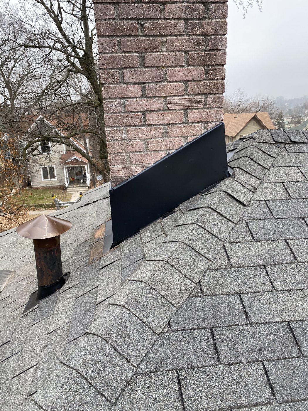 Chimney and Flue Pipe Re-Flash in West Michigan