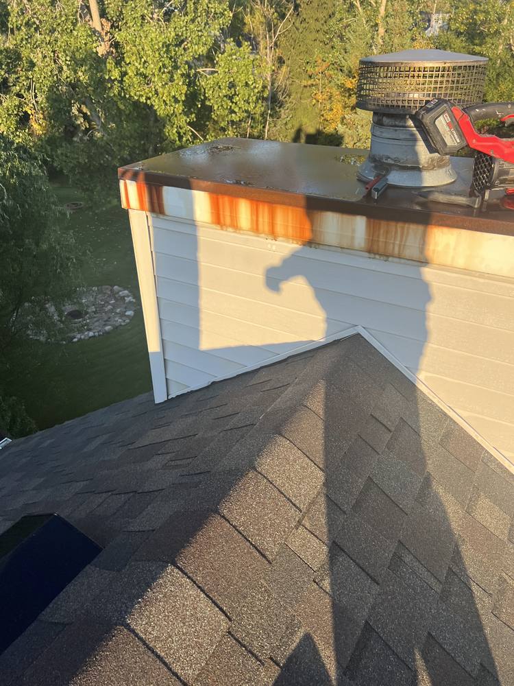 Chimney Chase Flashing Replacement in West Michigan — photo 1 of 13