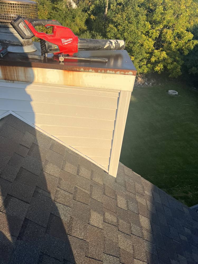 Chimney Chase Flashing Replacement in West Michigan — photo 2 of 13