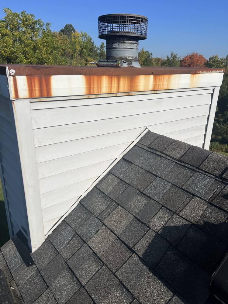 Chimney Chase Flashing Replacement in West Michigan — photo 11 of 13