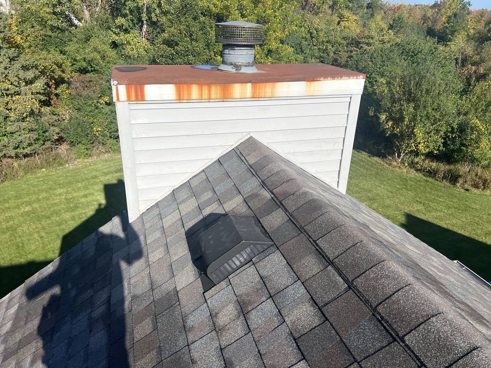Chimney Chase Flashing Replacement in West Michigan — photo 12 of 13