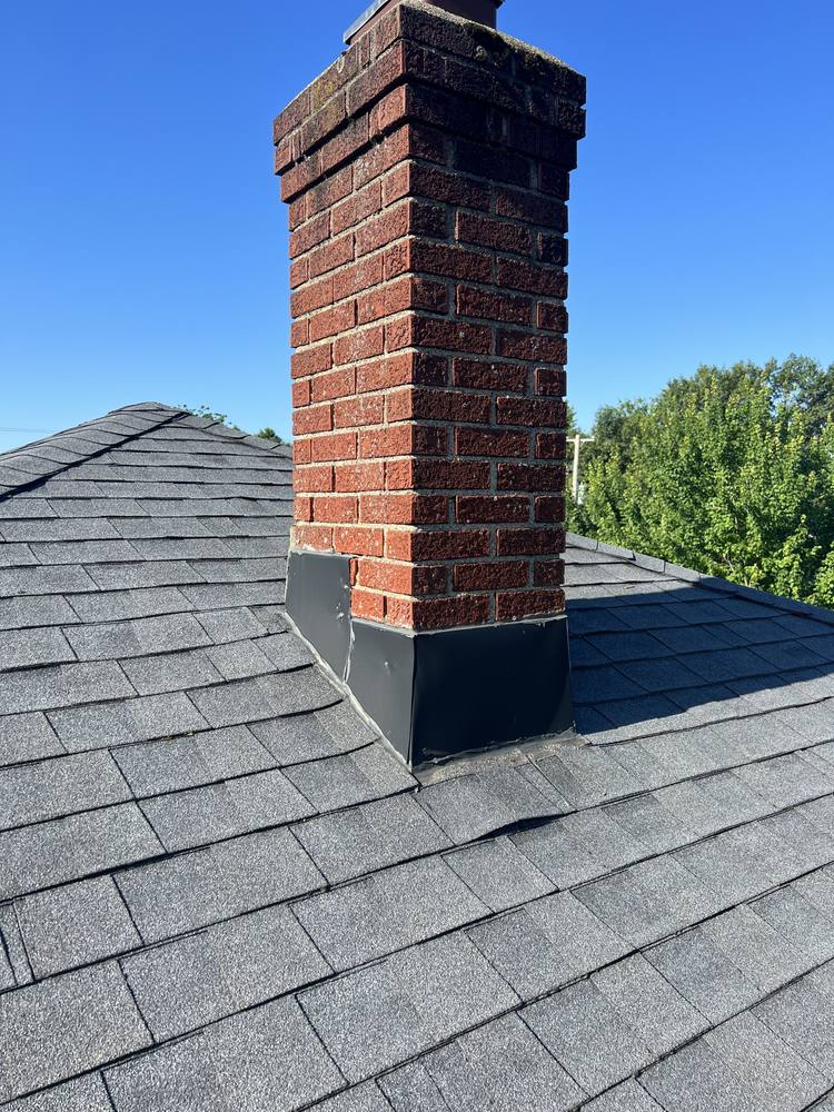 Chimney Re-Flash and Roof Vent in West Michigan — photo 1 of 15
