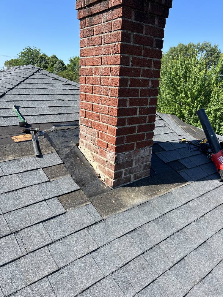 Chimney Re-Flash and Roof Vent in West Michigan — photo 11 of 15