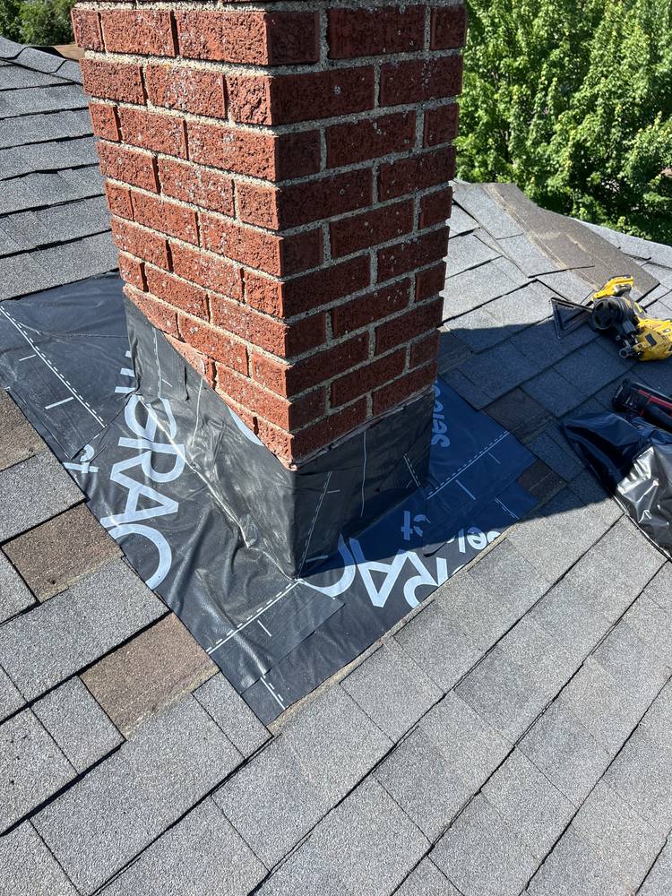 Chimney Re-Flash and Roof Vent in West Michigan — photo 12 of 15