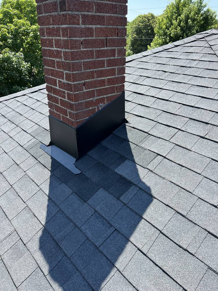 Chimney Re-Flash and Roof Vent in West Michigan — photo 14 of 15