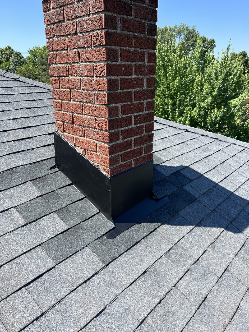 Chimney Re-Flash and Roof Vent in West Michigan