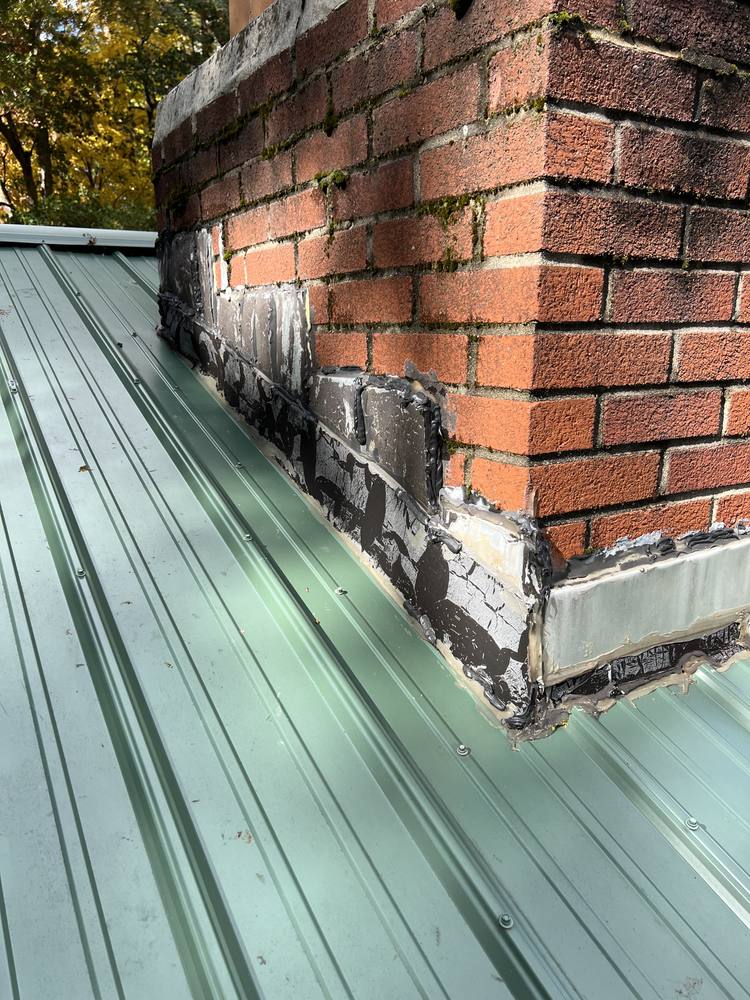 Chimney Repair on a Metal Roof in West Michigan — photo 2 of 18
