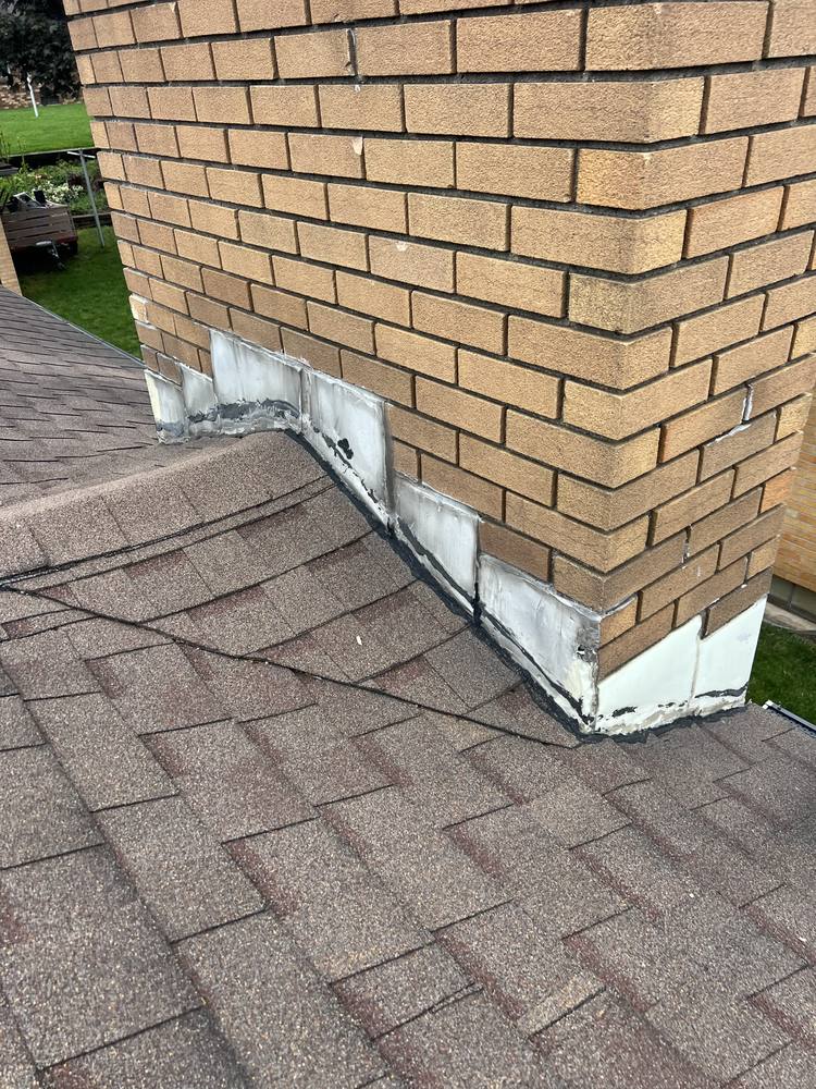 Chimney Step Flashing Repair in West Michigan — photo 1 of 12