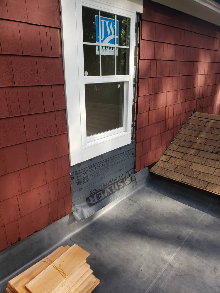 EPDM Flat Roof and Door-to-Window Conversion in West Michigan — photo 13 of 13