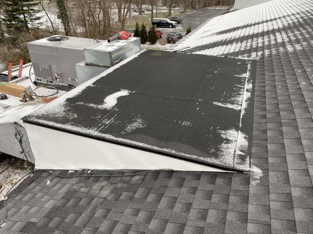 EPDM Flat Section on a Shingle Roof in West Michigan — photo 2 of 7
