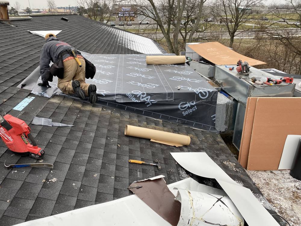 EPDM Flat Section on a Shingle Roof in West Michigan — photo 3 of 7