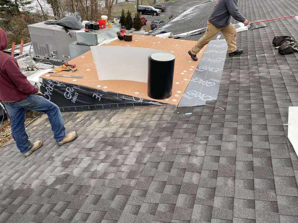 EPDM Flat Section on a Shingle Roof in West Michigan — photo 5 of 7