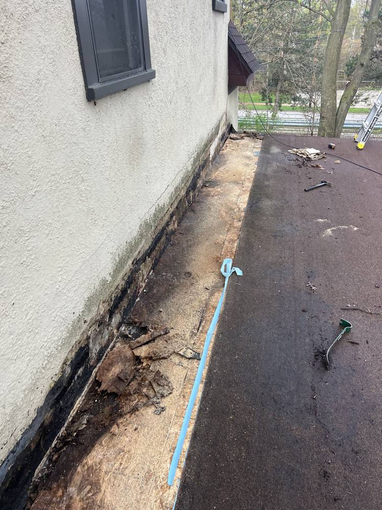 Flat Roof-to-Wall Repair in West Michigan — photo 2 of 20