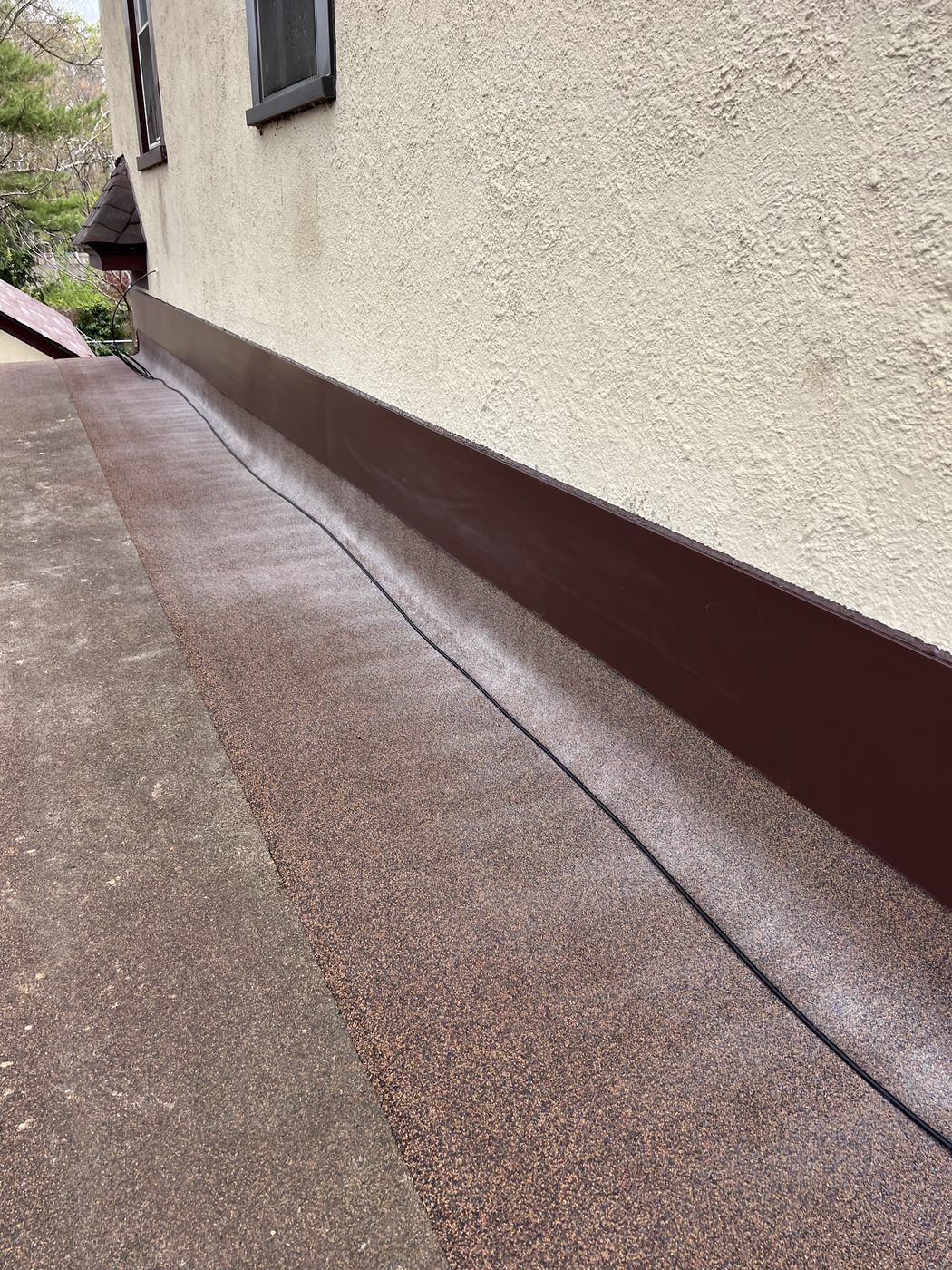Flat Roof-to-Wall Repair in West Michigan
