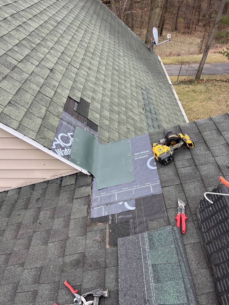 Pitch Intersection and Eave Edge Repair in West Michigan — photo 21 of 24