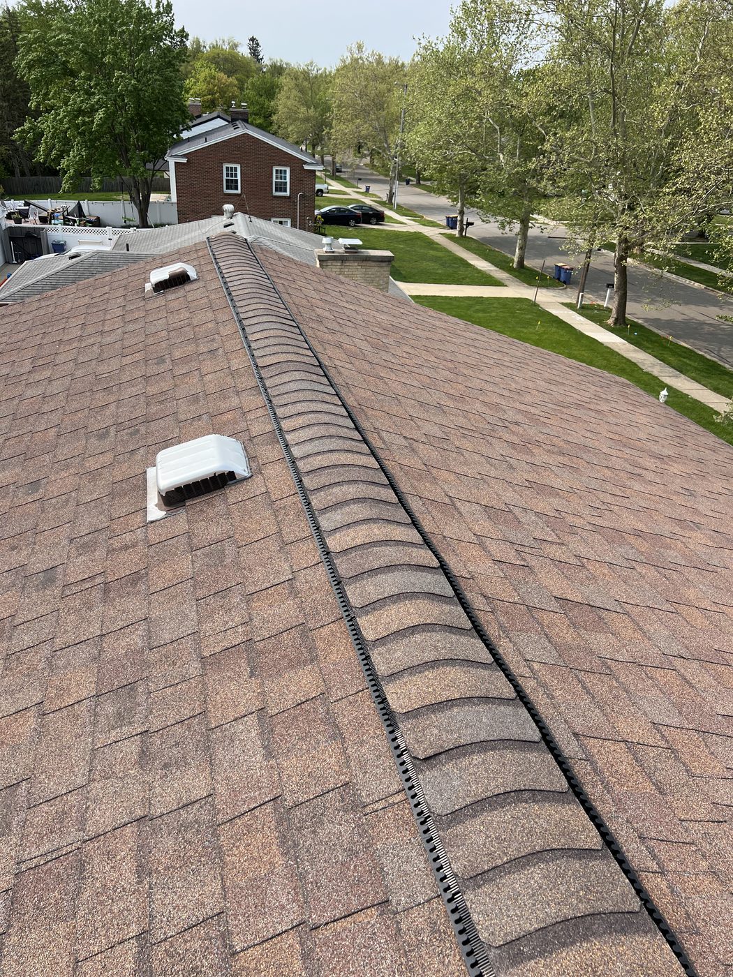 Ridge Vent and Bath Fan Vent Added in West Michigan