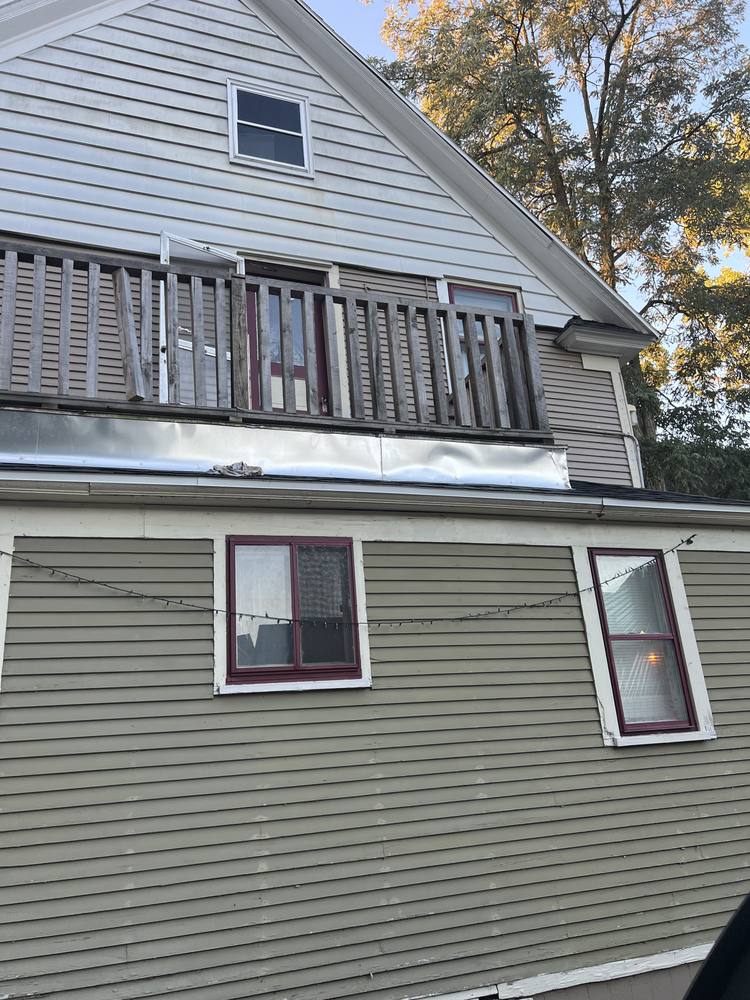 Small Flat Roof Rebuild in West Michigan — photo 1 of 17