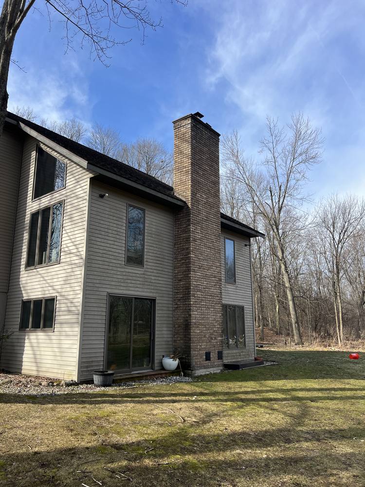 Stone Chimney Re-Flash in West Michigan — photo 1 of 22