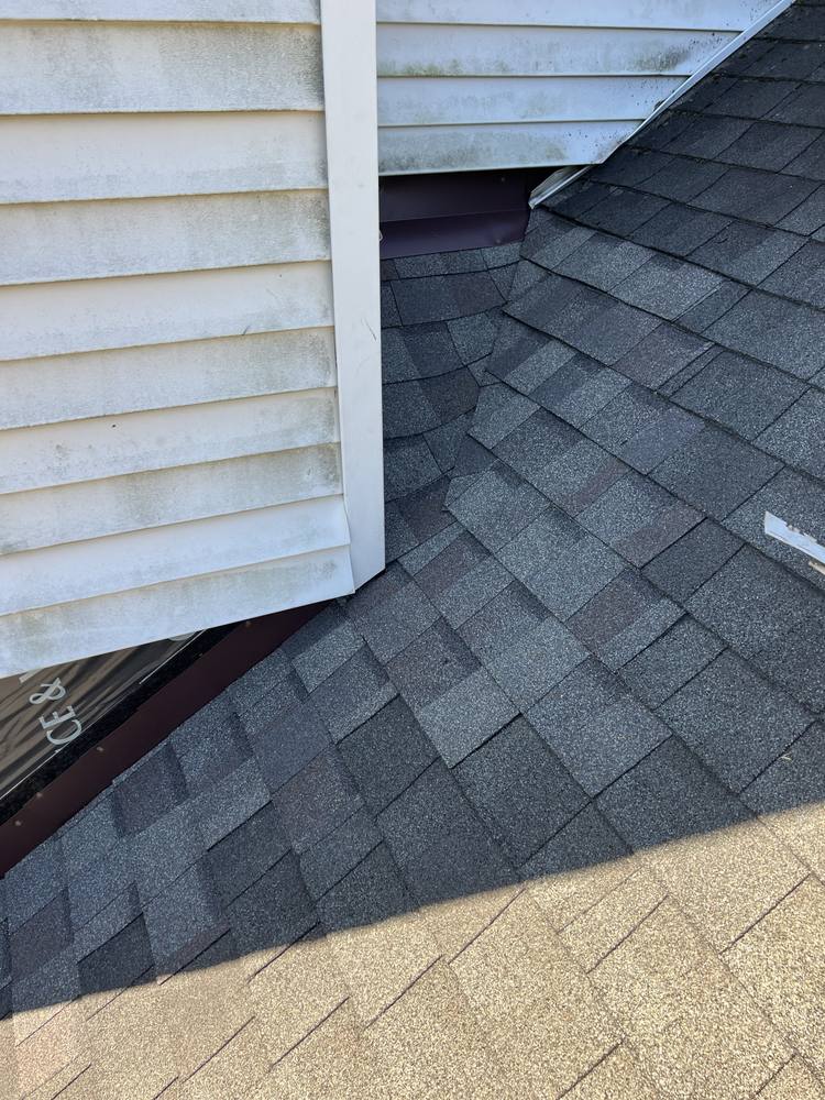 Vinyl-Sided Chimney Flashing in West Michigan — photo 10 of 16