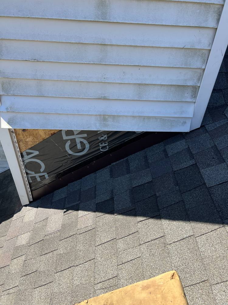 Vinyl-Sided Chimney Flashing in West Michigan — photo 11 of 16