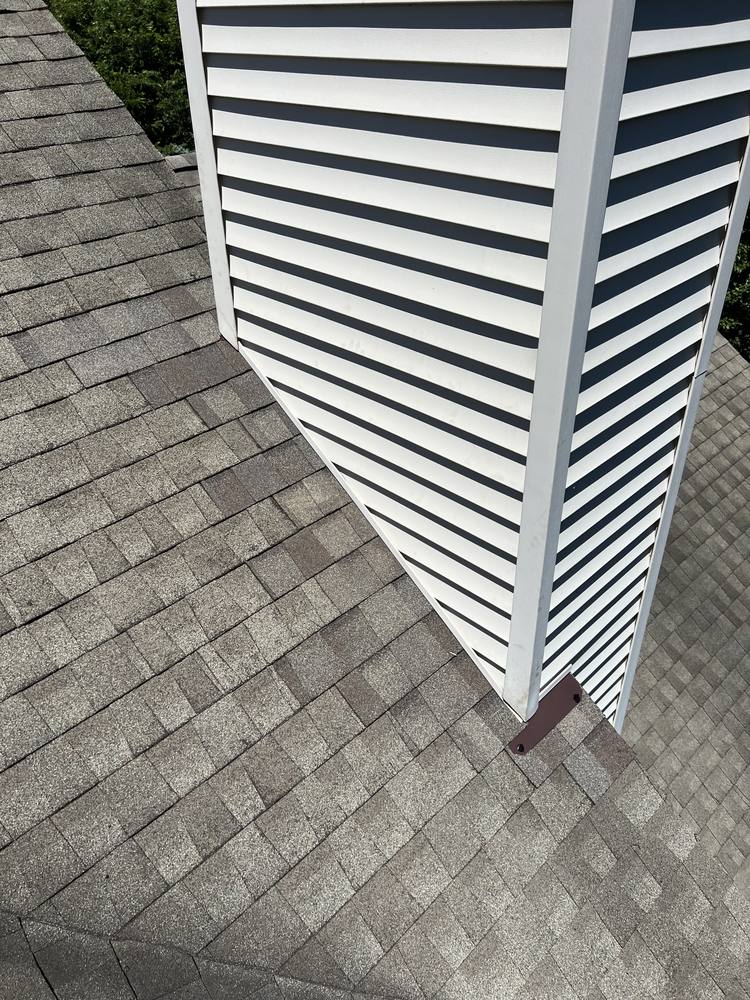 Vinyl-Sided Chimney Flashing in West Michigan — photo 16 of 16